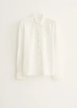 Geborduurde kanten blouse