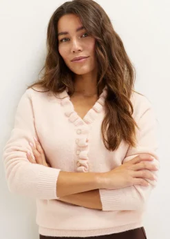 Gebreide trui met ruffles