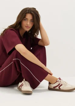 Sneakers met bordeaux accent